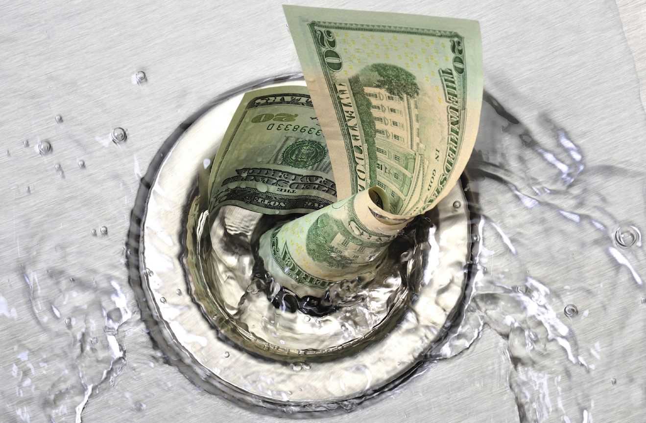dollar draining in the lavatory