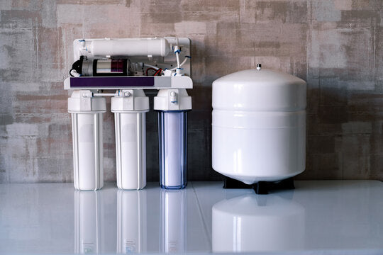 how to clean water filter tank